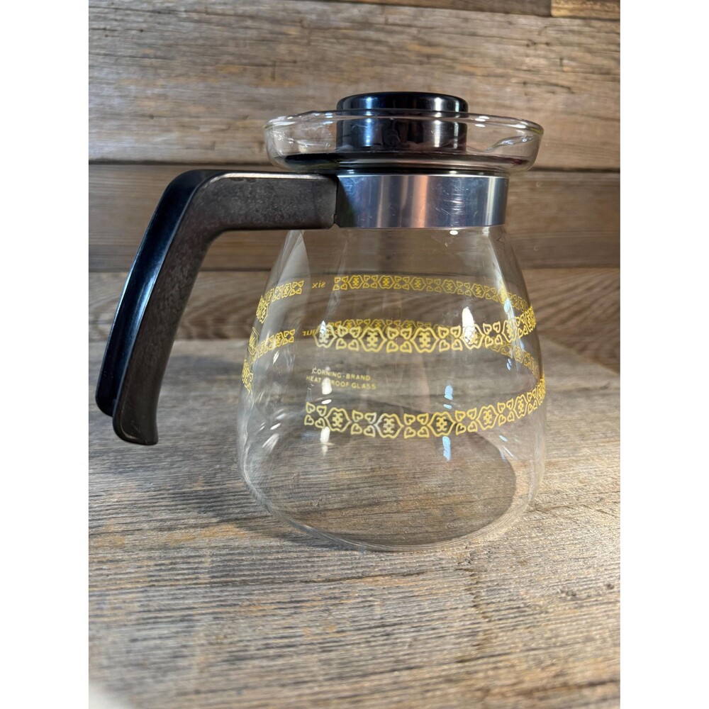 Vintage Melitta Corning 6-cup glass coffee carafe with a yellow retro pattern